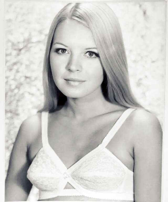 Model in vintage bra by photographer Doug Wilkins.