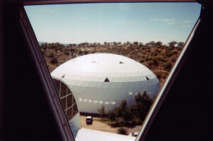 Looking out the window of the library tower of the Biosphere 2 Center at the West Lung, one of the facility’s two lungs. Photograph by Michael Aaron Gallagher, taken in 1998.