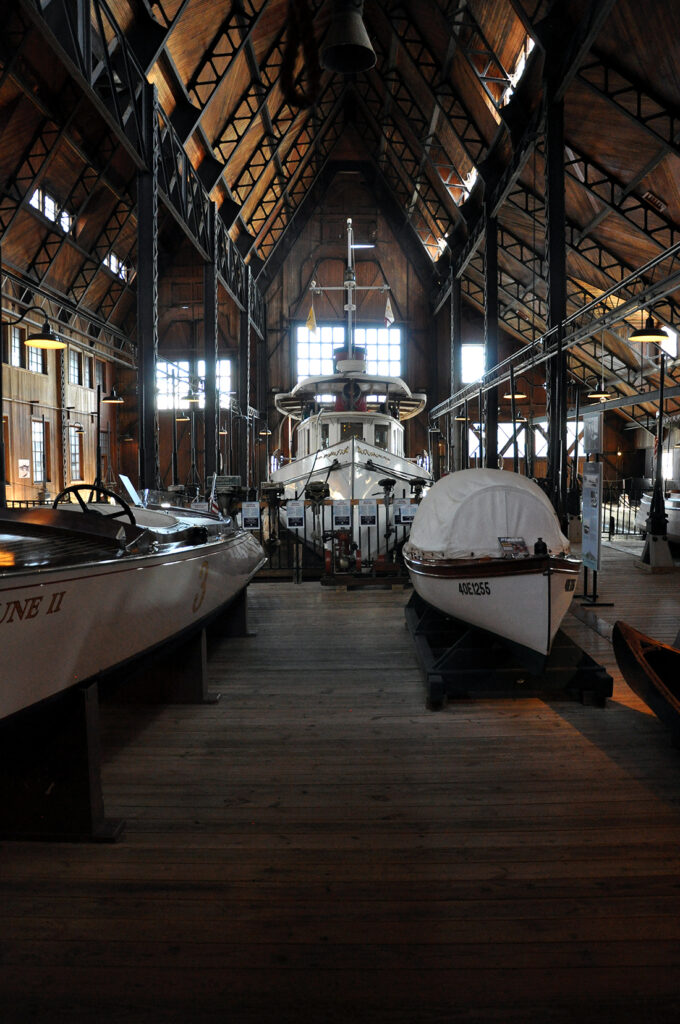 Antique boats inside the Boldt Yacht House by Michael Aaron Gallagher