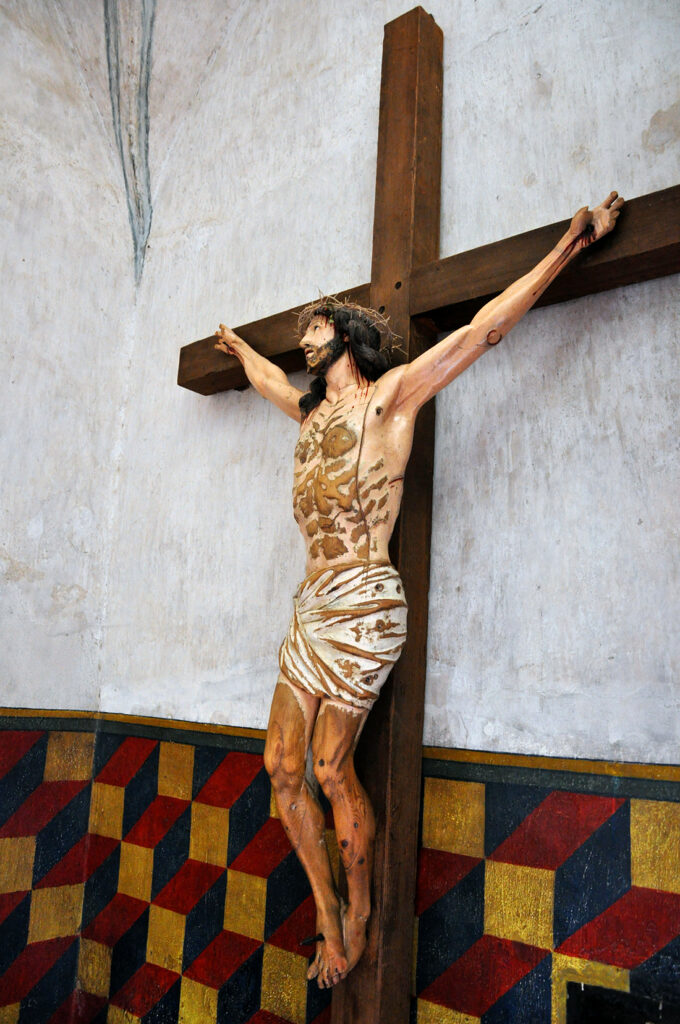 Jesus on the cross at the San Xavier del Bac Mission by Michael Aaron Gallagher