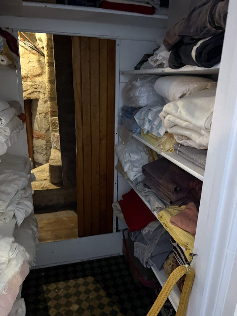 Secret passage behind the closet wall at Singer Castle by Michael Aaron Gallagher