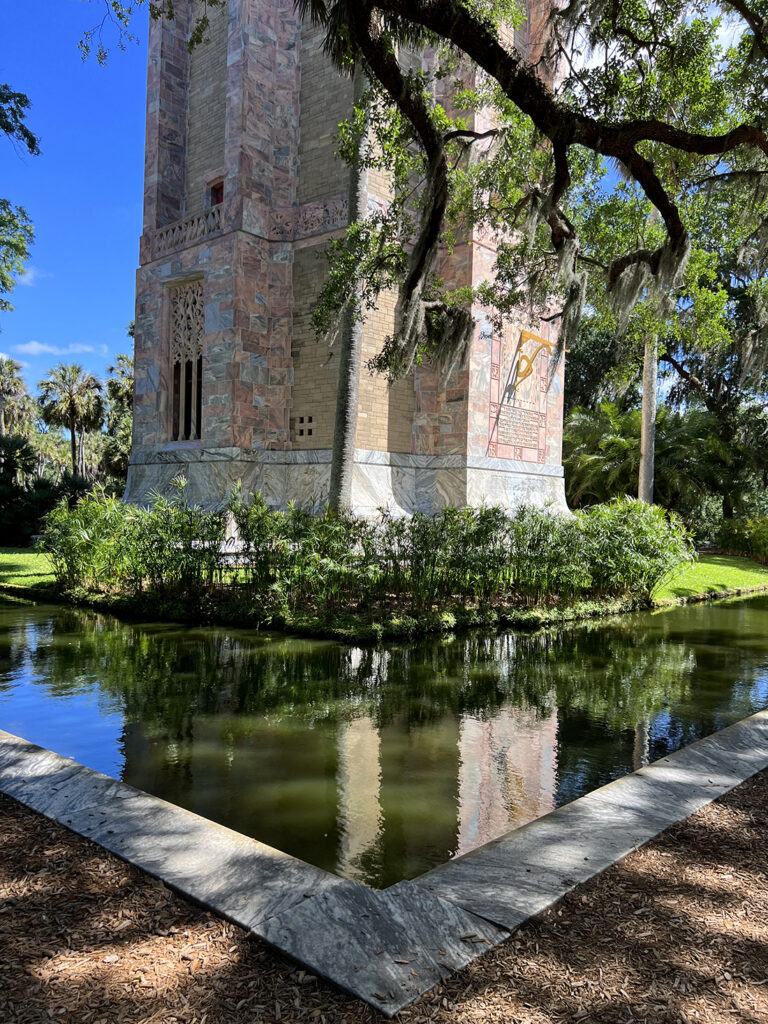 The koi pond moat around the Singing Tower at Bok Tower Gardens by Michael Aaron Gallagher