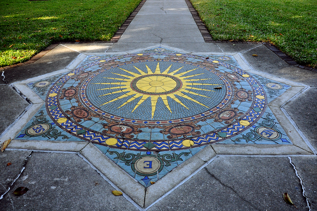 From 1926, the compass rose tile Zodiac mosaic with astrological symbols on the walkway at Ca' d'Zan. Photo by Michael Aaron Gallagher.