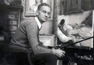 Maurice Ehlinger painting in his art studio